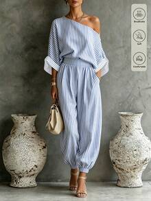 SHEIN Fiorisel 女款春夏慵懶紋理不對稱肩休閒兩件套，不對稱肩設計搭配寬鬆落肩短袖上衣與高腰鬆緊收口燈籠褲，同色系紋理面料打造隨性氛圍，適合日常通勤、休閒外出、居家穿著等多場合，女款不對稱肩休閒兩件套，紋理寬鬆版型套裝，不對稱設計上衣＋收口褲，慵懶夏季套裝 - 藍色 - 查看 3