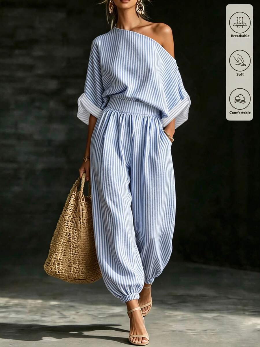 SHEIN Fiorisel 女款春夏慵懶紋理不對稱肩休閒兩件套,不對稱肩設計搭配寬鬆落肩短袖上衣與高腰鬆緊收口燈籠褲,同色系紋理面料打造隨性氛圍,適合日常通勤、休閒外出、居家穿著等多場合,女款不對稱肩休閒兩件套,紋理寬鬆版型套裝,不對稱設計上衣+收口褲,慵懶夏季套裝 - 藍色 - 查看 1