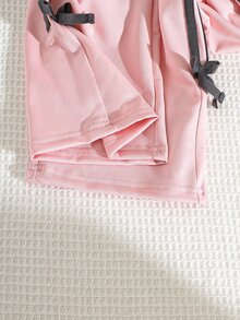 SHEIN Playful Pals 女童 2 件式休閒套裝，落肩短袖 T 恤搭配前胸蝴蝶結印花、對比條紋蝴蝶結裝飾寬腿長褲，返校穿搭服飾 - 粉色 - 查看 8