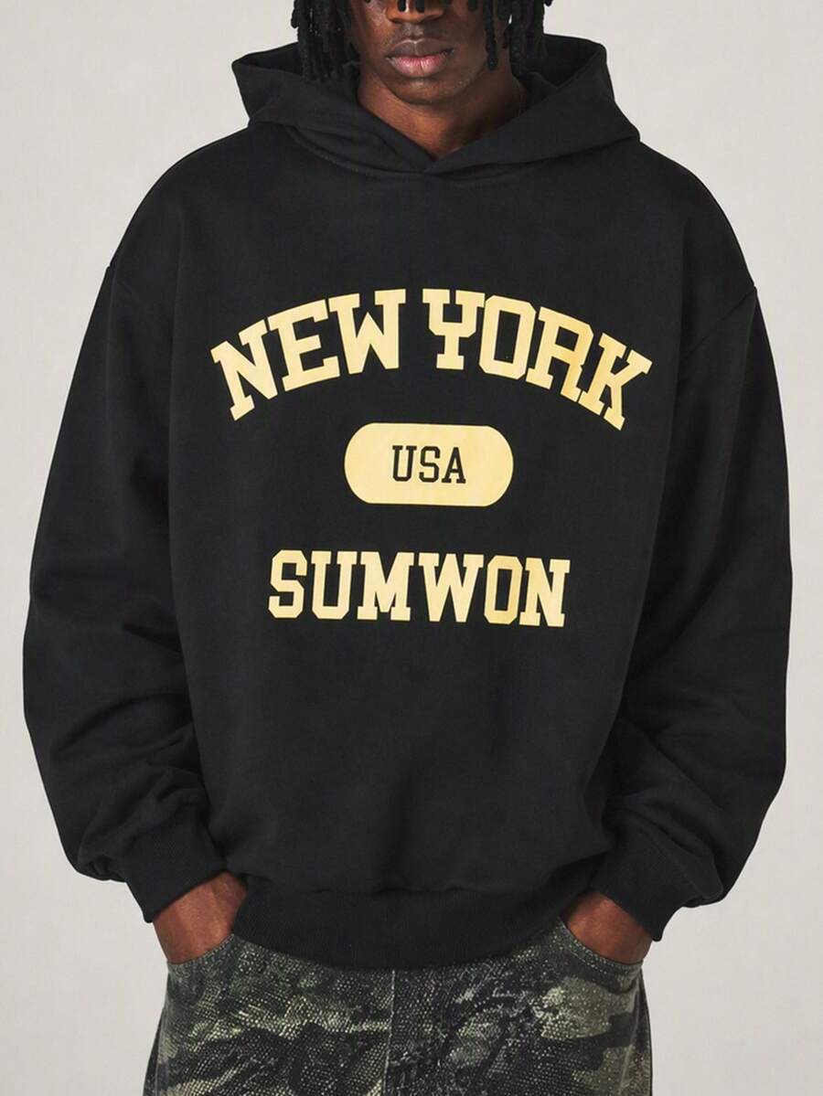 SUMWON New York USA Varsity Text Print Oversized Pullover Hoodie With Long Sleeves And Hooded Neckline - Black - View 1