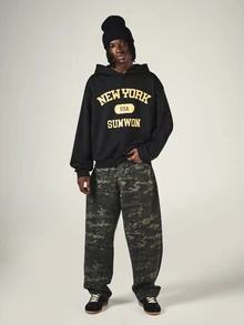 SUMWON New York USA Varsity Text Print Oversized Pullover Hoodie With Long Sleeves And Hooded Neckline - Black - View 4