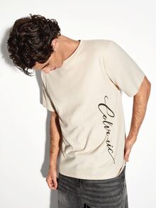 COLVENIC Apricot Drop Shoulder Short Sleeve T-Shirt For Men, Side Vertical Handwritten Cursive Letter Print, Loose Fit Pure Cotton Casual Half Sleeve - Apricot - View 7
