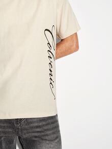 COLVENIC Apricot Drop Shoulder Short Sleeve T-Shirt For Men, Side Vertical Handwritten Cursive Letter Print, Loose Fit Pure Cotton Casual Half Sleeve - Apricot - View 3