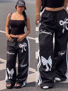 Muchica Plus Size Bow Print Striped Drawstring Waist Loose Pants - Multicolor - View 1