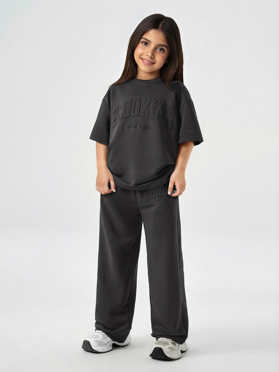 SHEIN Tween Girls' Loose Casual Minimalist Comfortable Round Neck Drop Shoulder Short Sleeve T-Shirt And Pants Set Summer Outfits - Black - View 1