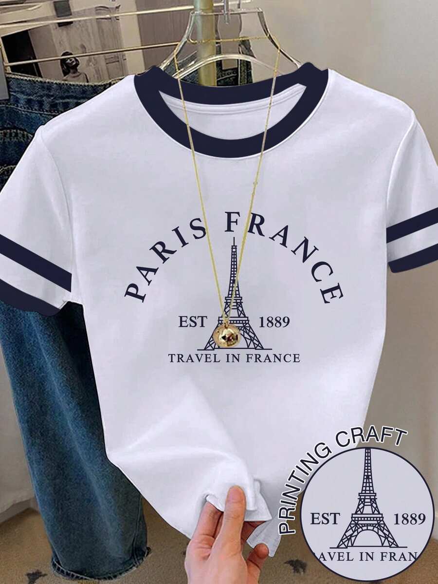 少女休闲简约时尚经典巴黎埃菲尔铁塔图案T恤,印有“PARIS FRANCE 1889”英文字样,黑白撞色设计,圆领短袖高腰露脐常规款T恤,适合夏季穿着 - 彩色 - 查看 1