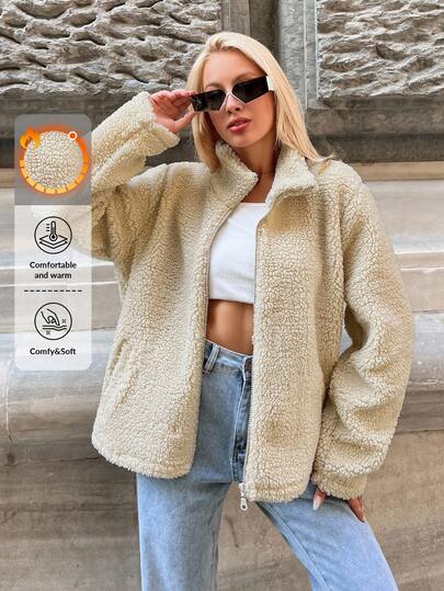 SHEIN معطف تيدي كاجوال بجيوب وسحاب وأكتاف منسدلة باللون البيج الموحد للمقاسات الكبيرة