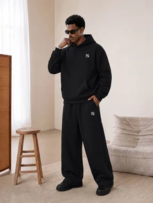 STYNVO Men's Black Hoodie & Wide Leg Sweatpants Tracksuit Set, Oversized Embroidered Streetwear Co-Ord - Black - View 1