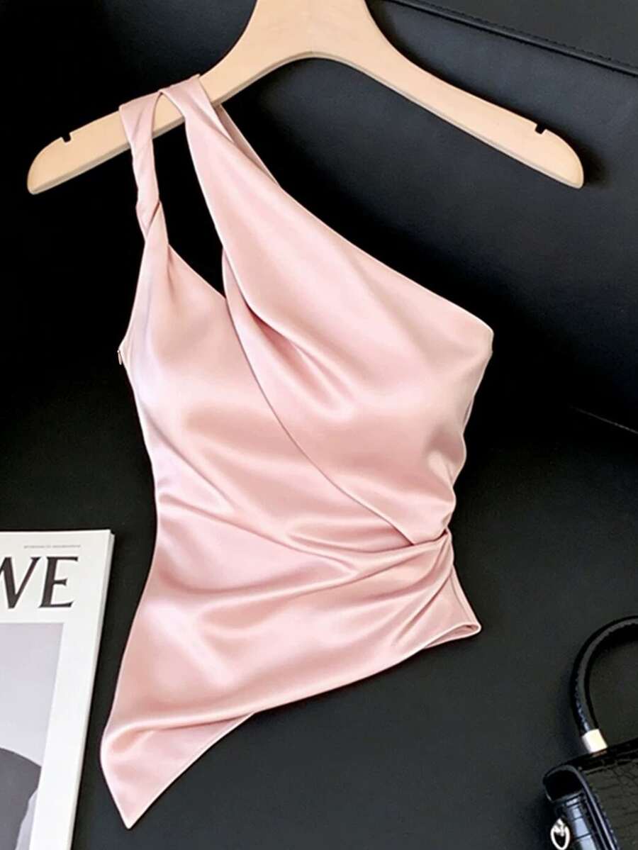 Modelyn 辣妹風粉色不對稱領鏤空背心上衣 夏季收腰百褶設計 小眾不對稱領 女款性感優雅上衣