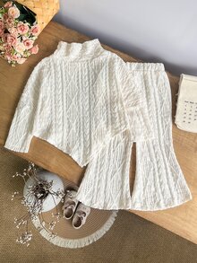 SHEIN طقم محبوك من قطعتين للبنات الرضع بزينة فيونكة، بلون مشمشي فاتح، ملابس علوية بياقة عالية مع بنطال واسع الساق بتصميم جرس، لطيف للخريف - لون مشمشي - مشاهدة 3