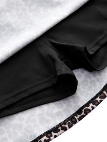 SHEIN Cheerettes 女款豹紋裙褲 高彈力 透氣 吸濕排汗 寬鬆版型 內建內褲 側邊口袋 適用網球跑步 - 彩色 - 查看 6