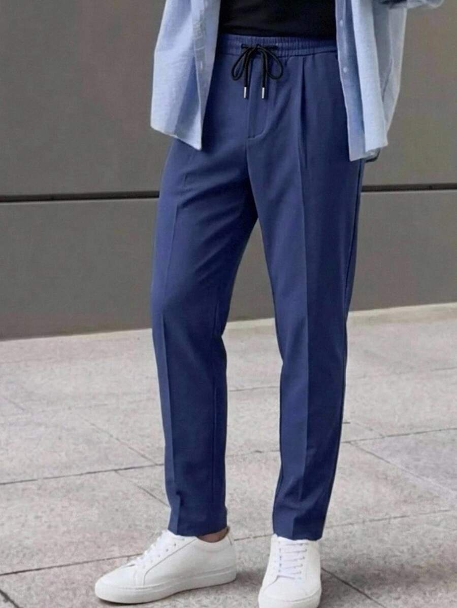 HIMLAND Men's Solid Color Drawstring Waist Pocket Casual Versatile Daily Travel Long Pants - Navy Blue - View 1