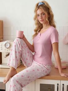 SweetSlumber Women's Solid Color Short Sleeve Top And Bow Print Long Pants Pajama Set - Pink - View 12