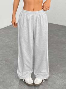 SHEIN EZwear 大码女式休闲黑色侧条纹裤，简约时尚，适合日常休闲穿着、毕业季、返校季、毕业典礼、女教师着装等场合。这款阔腿运动裤舒适宽松，版型宽松，适合各种场合。 - 淺灰色 - 查看 9