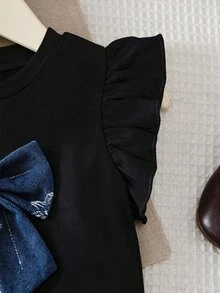 Souflis Souflis 2件組女童春夏黑色圓領荷葉袖T恤，附3D蝴蝶結裝飾與花卉提花百褶迷你裙（含2個蝴蝶結），休閒套裝，適合日常穿著、旅行、度假與派對 - 黑色 - 查看 5