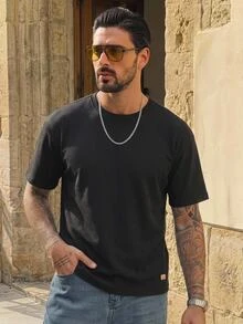 HIMLAND Men's Solid Color Round Neck Short Sleeve Casual Versatile T-Shirt, Vacation, Father's Day Gifts, Football - Black - View 1