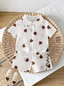 SHEIN Vintaside Kids 2件組男嬰卡通熊印花短袖單排扣上衣與短褲休閒可愛趣味套裝 白色夏季家庭拍照穿搭 - 白色 - 查看 1