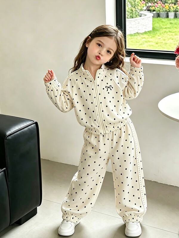 SHEIN Genkimix Kids 2pcs/Set Girls' Spring/Autumn New Apricot Black Polka Dot Bow Tie Heat Transfer Print Sweet Casual Fashion Heart-Shaped Woven Tape Decor Stand Collar Zipper Top & Casual Long Pants Cute Sweet Outfit Suitable For Daily Elegant Sporty School Casual Wear