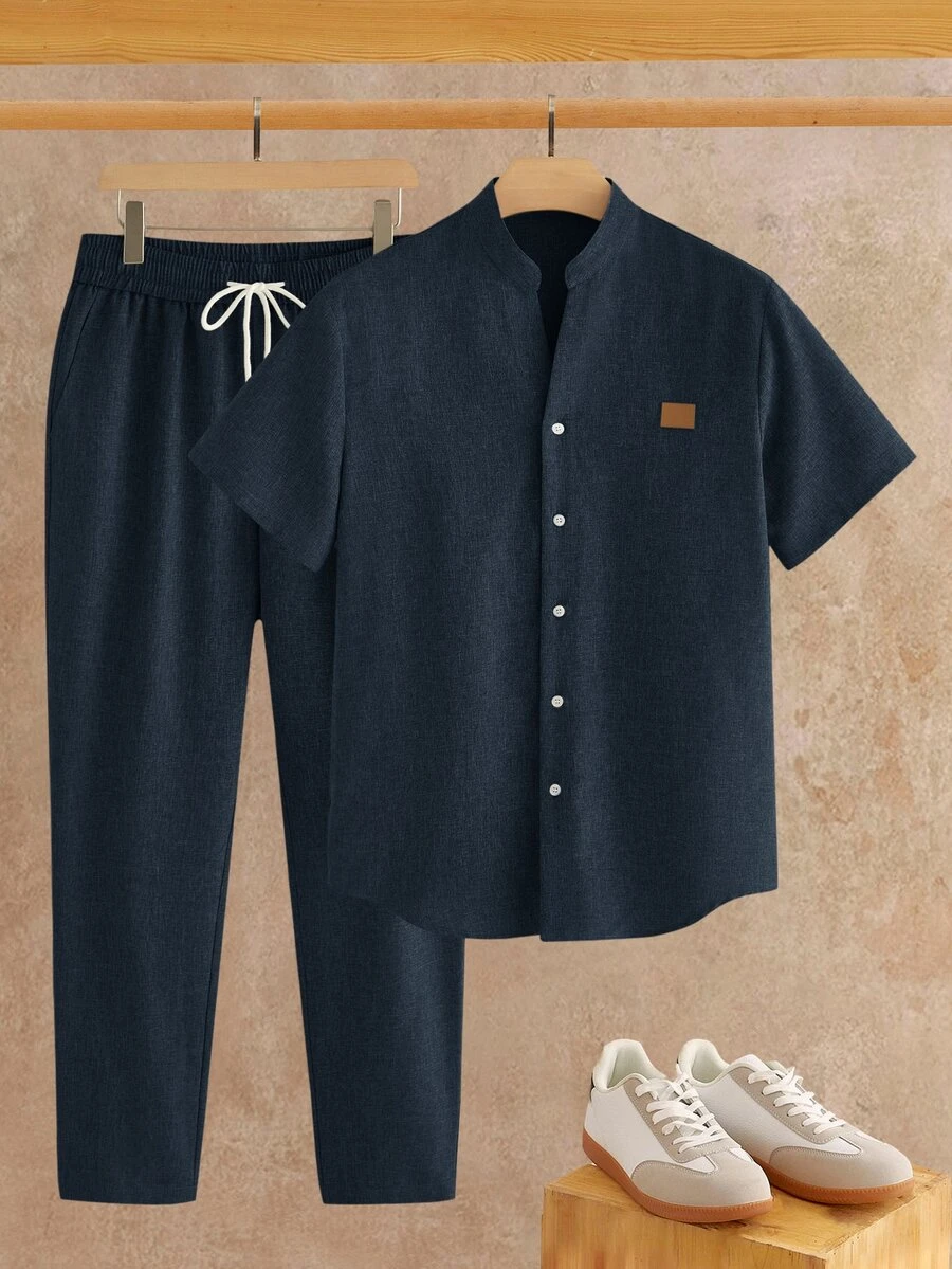 HIMLAND Men's Solid Color Single Breasted Short Sleeve Shirt And Elastic Drawstring Waist Design Long Pants Casual Set , Vacation Navy Blue Summer - Navy Blue - View 1
