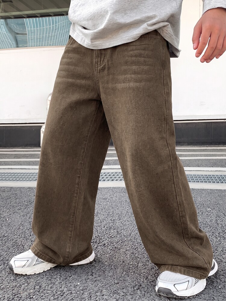 SHEIN Genkimix Kids Boys' Denim Long Pants, All Season, Soft, Cotton, Casual, Fashion, Versatile, Comfortable, Minimalist, Elastic Waistband, Classic Five-Pocket Design, Leather Patch Decoration, Loose Straight Wide Leg Fit, Brown Washed Denim Long Pants Suitable For Daily Wear And Vacation - Brown - View 6