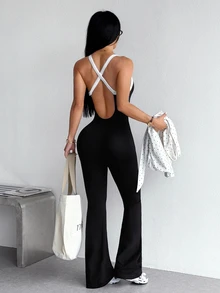 StreetHx Women's Seamless Sports Jumpsuit With Backless Flare Leg - Black and White - View 2