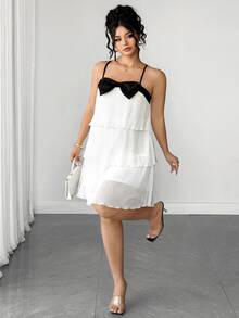 Rometta Plus Size Women's Spaghetti Strap Dress With Triple Layer Pleated Design And Prominent Black Bow On The Chest - White - View 8