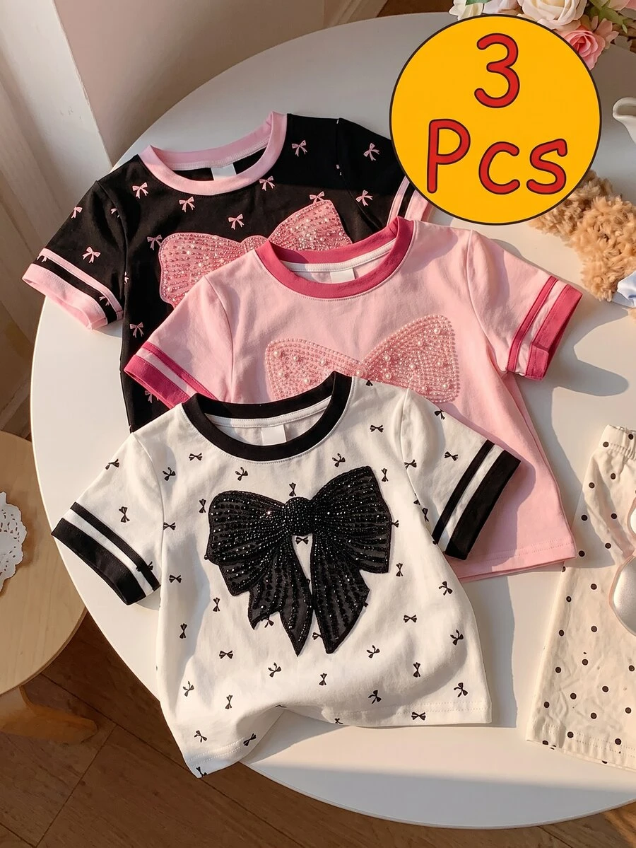 SHEIN 3件套女童新款SS26时尚休闲舒适度假黑白撞色领口袖口蝴蝶结印花短袖圆领T恤,适合夏季穿着 - 彩色 - 查看 1