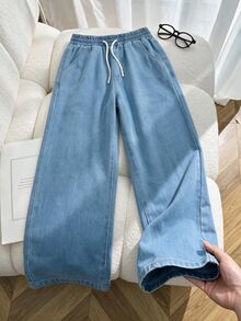 SHEIN Tween女孩淺色水洗休閒寬鬆牛仔長褲，舒適休閒度假大學風推薦！舒適淺色水洗藍牛仔布料，彈性腰帶抽繩設計＋高腰修身，完美貼合小Tween女孩，打造時尚長腿視覺效果。無論是日常出遊、校園休閒、開學季、旅行度假漫步等，都能化身活力街頭時尚達人！ - 淺色水洗藍 - 查看 4