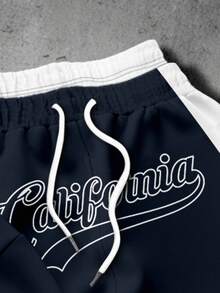 Manfinity EMRG Set Kasual Pria: Hoodie Lengan Panjang dan Celana Jogging dengan Motif Huruf - MultiWarna - View 5