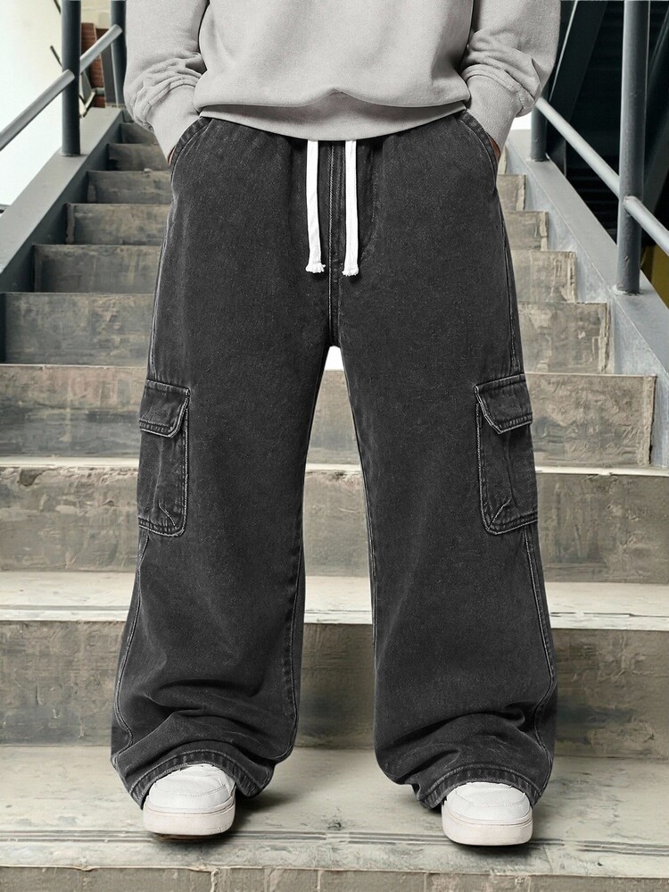 SHEIN Vacaura Tween Boy Cargo Straight Leg Pants, All-Season New Casual Minimalist Versatile Style With Large Side Cargo Pockets, White Drawstring Elastic Waist, Streetwear Black Grey Washed Cargo Wide Leg Denim Straight Pants, Pairs Well With Sweatshirts, T-Shirts, Sneakers, Suitable For Daily Wear And Vacation - Black - View 1