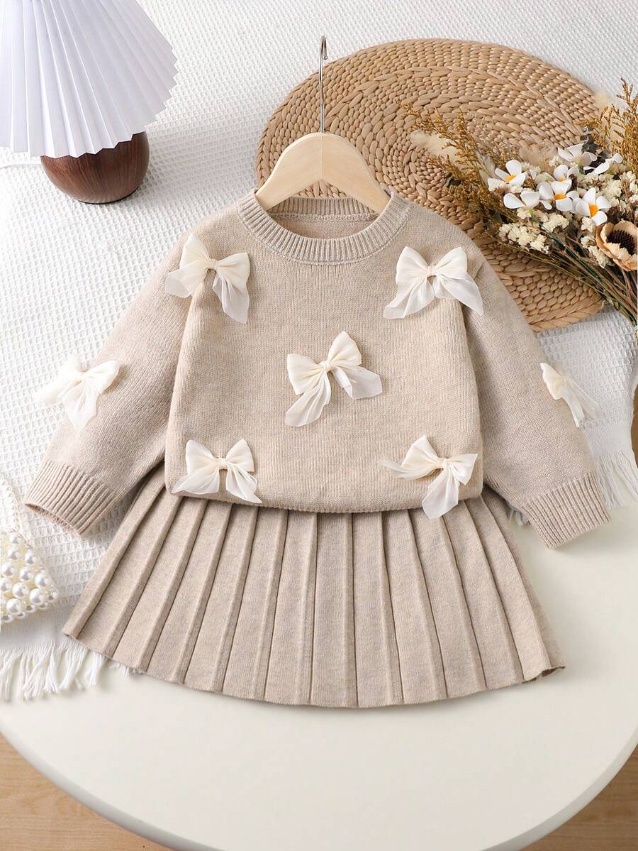 SHEIN Tween Girl Sweater Set Tween Girl Oatmeal Color Handmade Organza Bow Round Neck Drop Shoulder Long Sleeve Pullover Sweater + Matching Pleated Skirt Set - Apricot - View 1