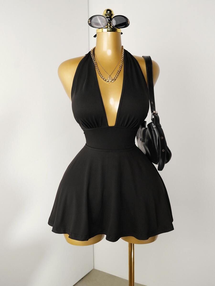Mistrie Black Tight-Fitting Romper With Deep V-Neck, Backless Strap