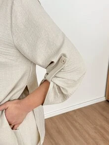 Shapeblank طقم كاجوال من قطعتين للنساء بمقاسات كبيرة، قميص برقبة دائرية وأكمام ملفوفة وبنطال بلون موحد - لون مشمشي - مشاهدة 6