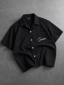 SUMWON Oversized Short Sleeve Button-Up Shirt With Chest Pocket Script Logo Summer Casual Relaxed Fit Drop Shoulder Woven Top - Black - View 1