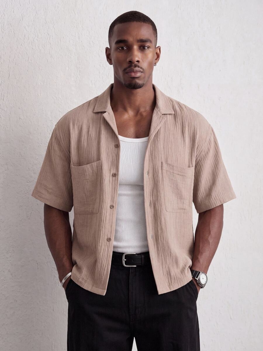 Mainfolk Men's Khaki Short-Sleeve Button-Up Shirt. Relaxed Fit, Classic Collar, Chest Pockets. Versatile For Beach Vacations &