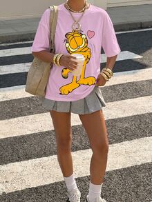 Muchica GARFIELD | SHEIN 34%棉休閒極簡圖案圓領短袖寬鬆女款T恤，卡通印花設計，適合外出、街頭穿搭、機場造型、時尚、返校、Y2K、派對、海灘度假、假期 - 淺粉色 - 查看 4