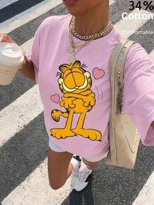 Muchica GARFIELD | SHEIN 34%棉休閒極簡圖案圓領短袖寬鬆女款T恤，卡通印花設計，適合外出、街頭穿搭、機場造型、時尚、返校、Y2K、派對、海灘度假、假期 - 淺粉色 - 查看 1