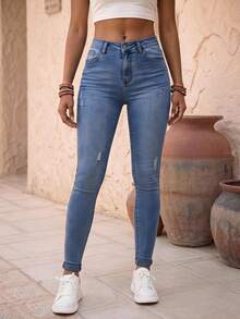 EMERY ROSE Jeans ajustados de talle alto con diseño de desgarro - Azul lavado medio - Ver 1