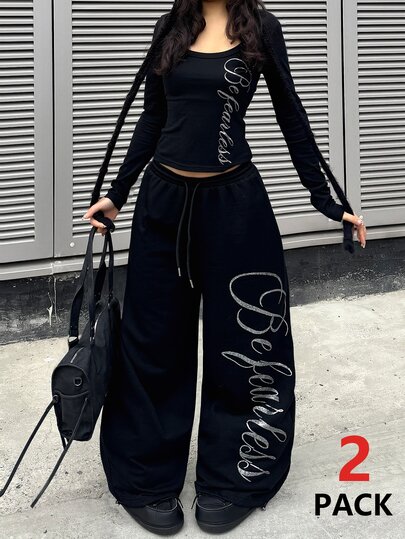 Coolane Set de 2 piezas: Top de manga larga con estampado gráfico de punto negro y pantalones con cordón