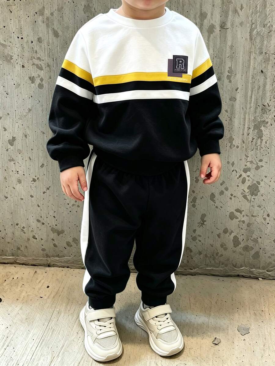 Genkimix Kids 2件組小男孩休閒運動學院街頭風可愛酷感圖案三拼條紋運動衫+長褲,適合日常穿著、上學、旅行、運動,春秋季節,整體設計簡約優雅,舒適時尚,展現休閒時尚形象,是男孩衣櫥的實用時尚選擇 - 黑與白 - 查看 1