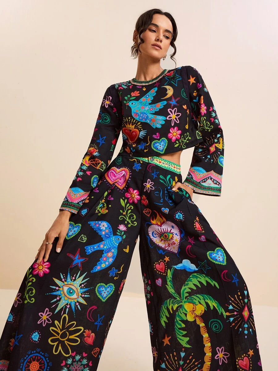 LOTSLUV Women's Early Autumn Casual Boho Holiday, Black Colorful Graffiti Print, Round Neck Long Sleeve Loose Short Top Long Pants 2-Piece Set Vacation - Black - View 1