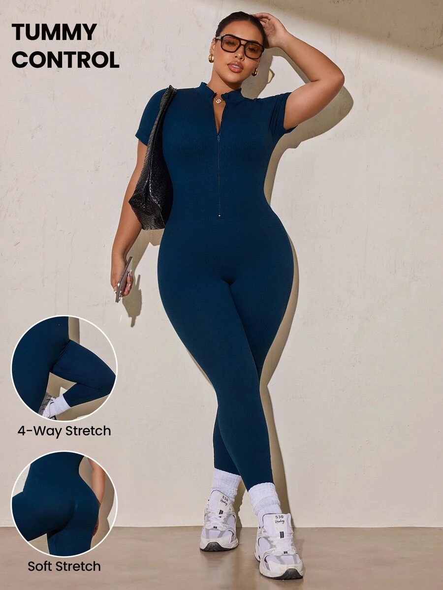 SHEIN Rhythm Era بدلة رياضية نسائية مقاس كبير بلون موحد مع سحاب أمامي وأكمام قصيرة - أزرق بحري - مشاهدة 1
