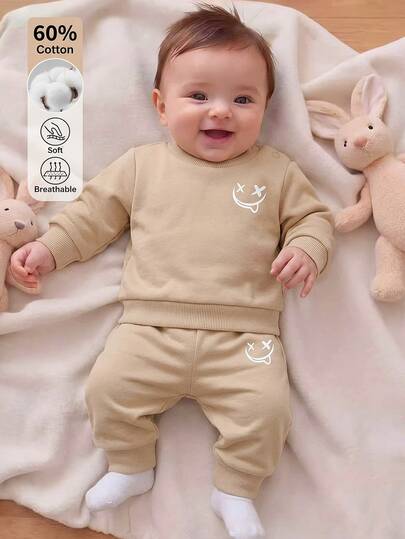 SHEIN 2pcs Newborn Baby Boy Khaki Smiling Face Print Cute Retro Casual Minimalist Korean Style Sweatshirt Set, Long Sleeve Long Pants Cartoon Ghost Face Print Fashion Sweatshirt And Sweatpants Set, Suitable For Spring And Autumn Daily Outings Or Indoor Versatile Wear