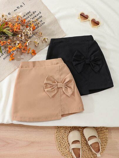 SHEIN Genkimix Kids Girls' Spring/Summer Skirt Set, Black And Khaki, Skirt Side Seam With 3D Bow Accessory, Sweet And Fashionable, Suitable For Outings, Parties And Sweet Style