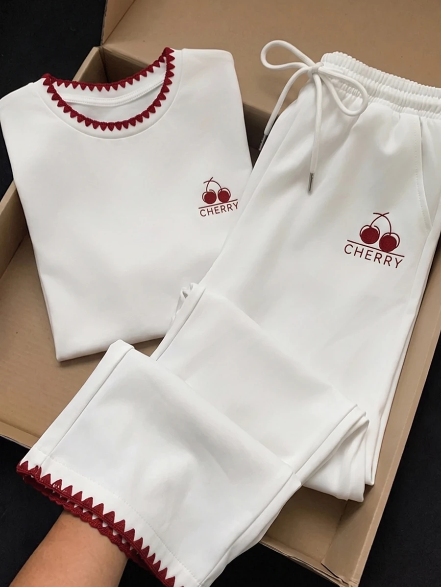 Comfortcana Chic Women's White Cherry Print Short Sleeve T-Shirt With Unique Red Crochet Detail On Neckline And