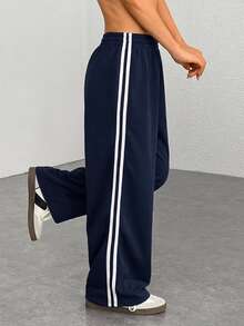 SHEIN EZwear 大码女式休闲藏蓝色侧条纹裤，简约时尚，适合日常休闲穿着、毕业季、返校季、毕业典礼、女教师着装等场合。宽松运动裤，阔腿运动裤，条纹运动裤，藏蓝色运动裤。 - 藏蓝色 - 查看 9