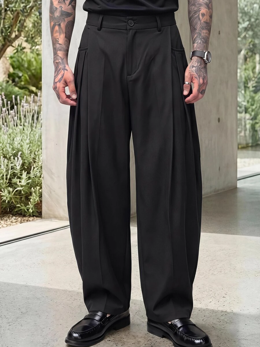 HIMLAND Men's Oatmeal High-Waisted Pleated Wide-Leg Trousers With Clean Front Drape. Structured Flowing Silhouette In Mid-Weight Suiting Blend. Black Pants - Black - View 1