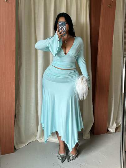 GalTyme Plus Size Women Solid Color Deep V-Neck Bell Sleeve Top And Pleated Asymmetric Hem Skirt Fashion 2 Pieces Set