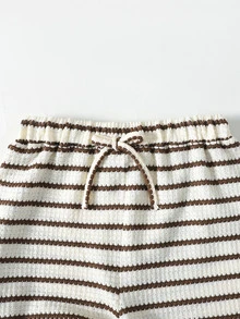 SHEIN Conjunto de camiseta de cuello redondo con bloques de color a rayas y pantalones sueltos con cintura de cordón para niña preadolescente - Blanco y Negro - Ver 5