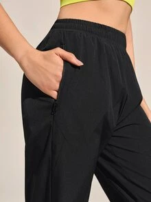 Exploreva Exploreva Women's Solid Color Drawstring Outdoor Casual Pants - Black - View 6